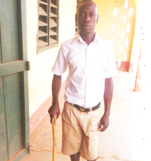 Nagurumo Fuseini with his walking stick